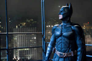 Christian Bale in a Batman suit with a clean shaven beard (Photo by charlieanders2 on Flickr)