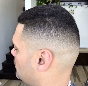 Fade hair cut with a line up