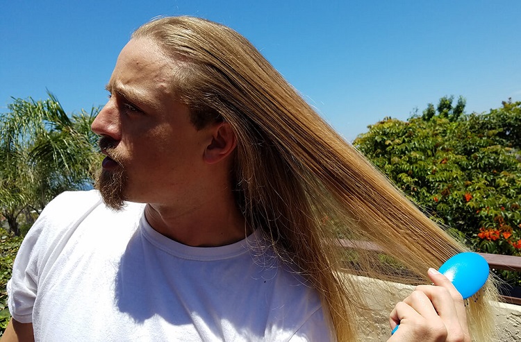 Man Brushing Long Hair